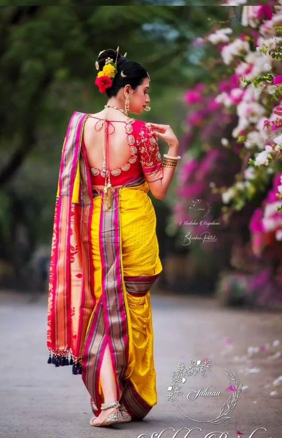 Indian woman in traditional saree looks back and smilingg Stock Photo |  Adobe Stock